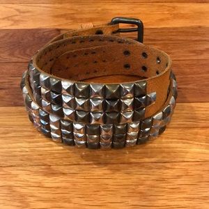 Leather studded belt. No missing studs.